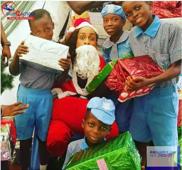 Photo: Denrele Edun Dressed As Santa Claus, Visit Kids To Share Gifts